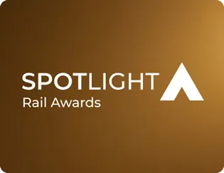 The Spotlight Rail Awards Logo - gold/orange background